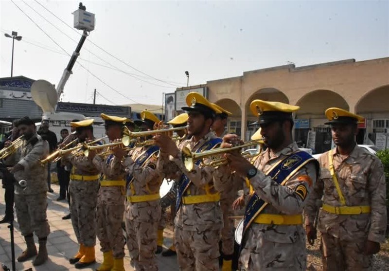 تشییع پیکر مادر شهید هاشمی در اهواز/ مادر در جوار فرزند شهیدش آرام گرفت + تصاویر