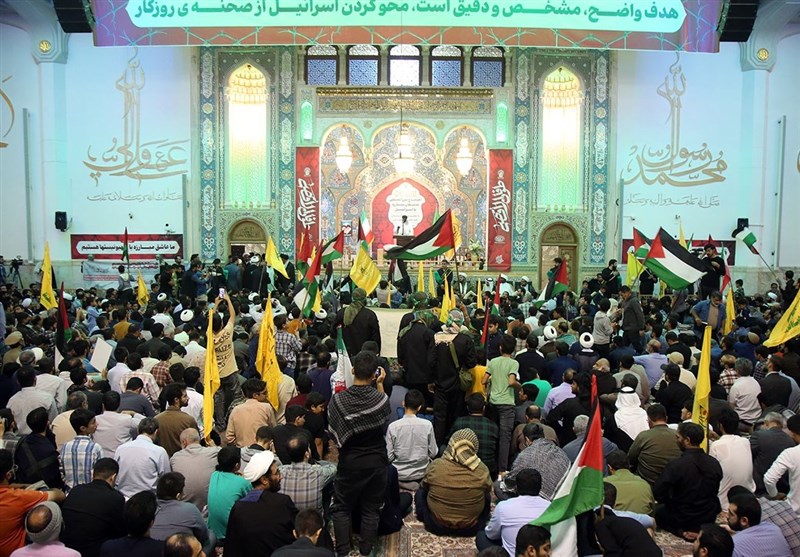 اجتماع بینالمللی عاشقان مبارزه با رژیم صهیونیستی در حرم بانوی کرامت + فیلم و تصاویر