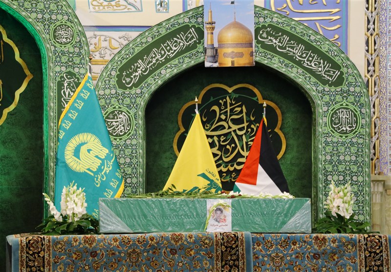 تشییع شهید مدافع حرم در مشهد/ پیکر شهید علیزاده در بهشت رضا آرام گرفت + تصاویر