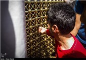 هادی و خانواده اش در حرم مطهر رضوی