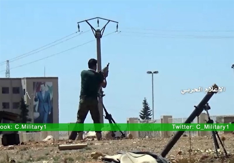 Syria Army Pulls Back from Aleppo Road to Let Aid Trucks In