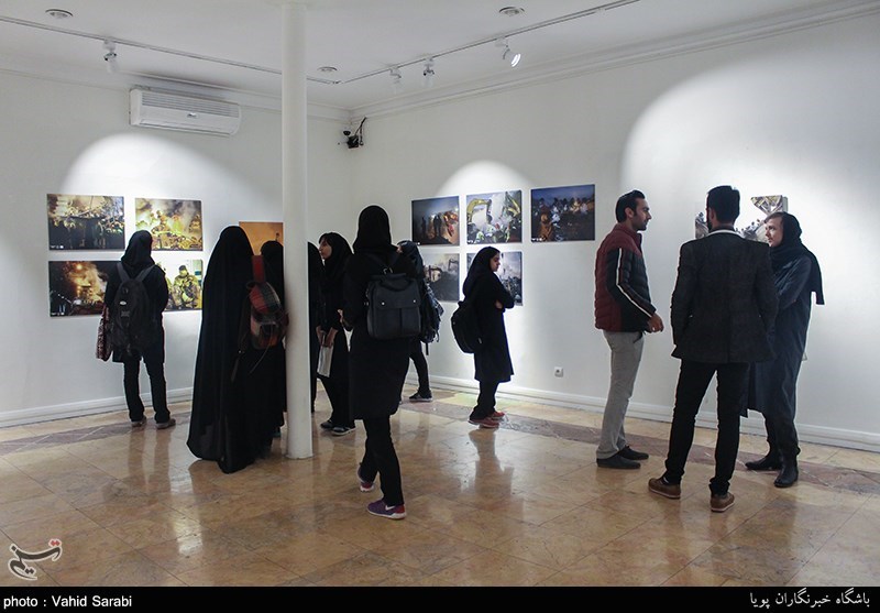 عکس , عکاسی , عشق و آتش , نمایشگاه عکس , حادثه ساختمان پلاسکو , پلاسکو , شهدای آتش نشان , 