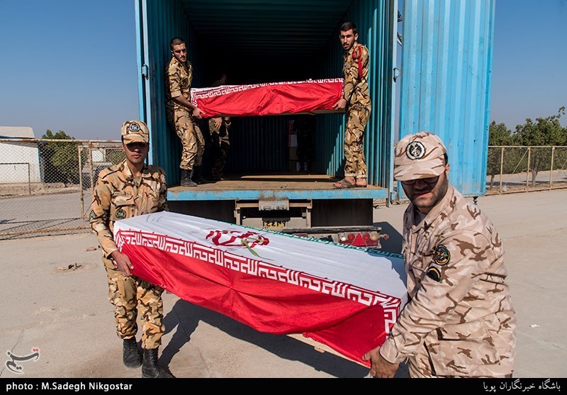 گرامیداشت 55 شهید تازه تفحص شده در معراج الشهدای اهواز
