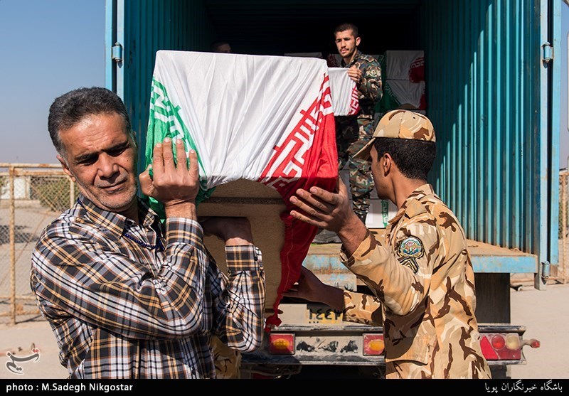 گرامیداشت 55 شهید تازه تفحص شده در معراج الشهدای اهواز