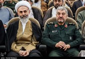 سرلشکر محمدعلی جعفری فرمانده کل سپاه و حجت‌الاسلام علی محمدی رئیس سازمان اوقاف و امور خیریه در مراسم تودیع و معارفه نماینده ولی‌فقیه در سپاه