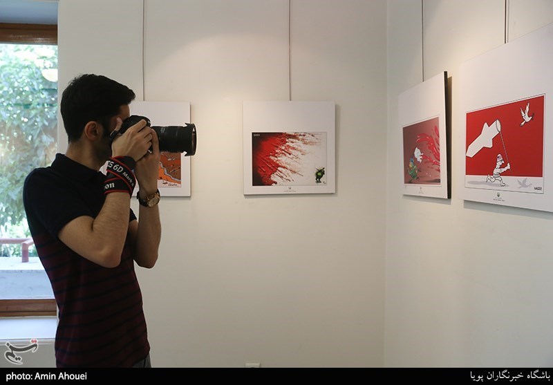 نمایشگاه کارتون و کاریکاتور أَلَیسَ الصُّبْحُ بِقَرِیب