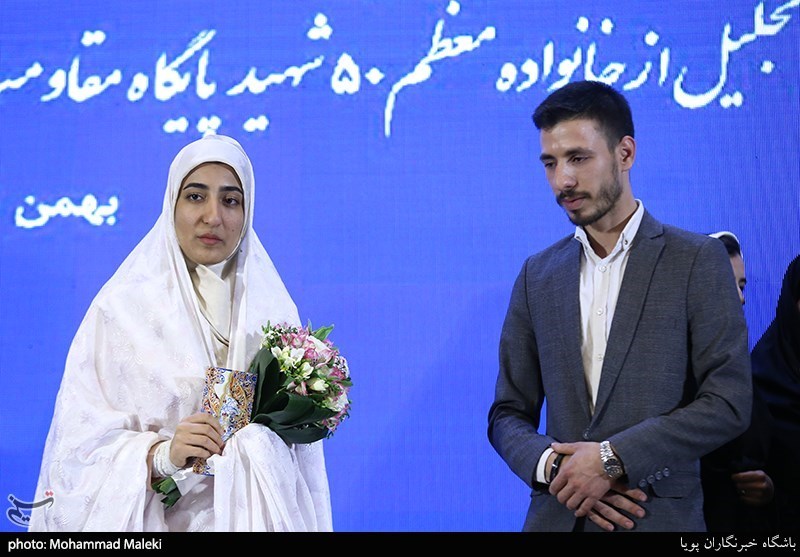 پیوند آسمانی زوج جوان در مراسم یادواره شهدا