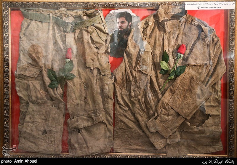 لباس تفحص شده شهید مدافع حرم جواد الله کرم