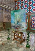حسن روح الامین نقاشی خود را به حرم شاه‌چراغ تقدیم کرد