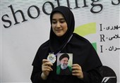 ماجرای حضور بانوی تیرانداز با عکس شهید رئیسی بر سکوی نایب قهرمانی