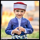 لبخند کودک کُرد