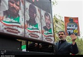 پوسترهای خاص در تشییع شهدای جنگ تروریستی اخیر