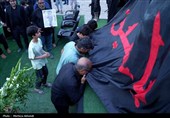 پرچم گنبد حرم امام حسین (ع) مرهم داغ خانواده شهدای میناب
