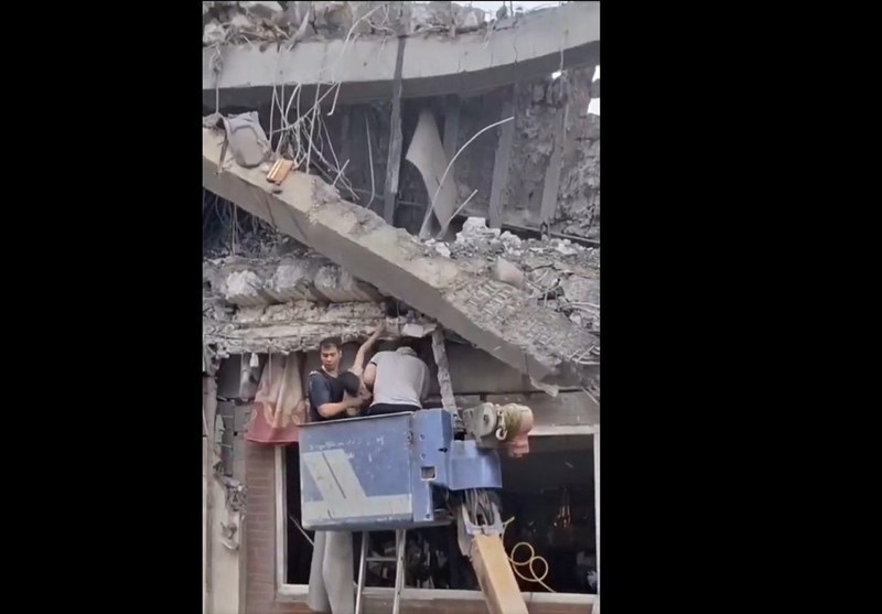 Afghan Child Rescued from Rubble amid US-Israeli Attacks on Iran