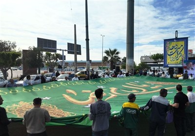 پرچم متبرک رضوی در بهارستان به اهتزاز درآمد