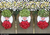 گل آرایی سقاخانه و پنجره فولاد حرم رضوی به مناسبت دهه کرامت