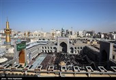 تعویض پرچم حرم مطهر رضوی
