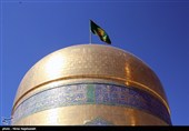 تعویض پرچم حرم مطهر رضوی