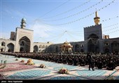 تعویض پرچم حرم مطهر رضوی