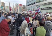 برگزاری تجمع اعتراضی ایرانیان مقیم ژاپن علیه جنگ در منطقه شینجوکو