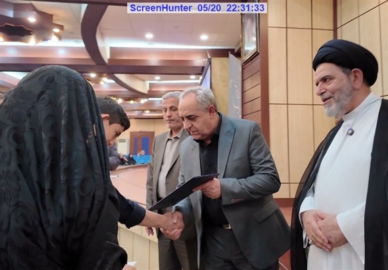 آئین تجلیل از خانواده شهدای جنگ رمضان