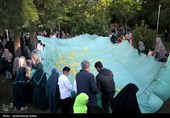 اهتزاز پرچم مزین به نام علی ولی الله (ع) بر فراز شهر همدان