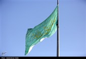 اهتزاز پرچم مزین به نام علی ولی الله (ع) بر فراز شهر همدان