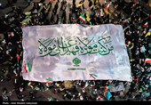 اهتزاز پرچم متبرک حرم امیرالمومنین(ع) در اجتماع مردمی ایران مقاوم در کرمان
