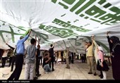 اهتزاز پرچم متبرک حرم امیرالمومنین(ع) در اجتماع مردمی ایران مقاوم در کرمان