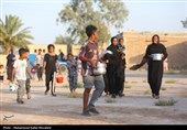 تهیه و توزیع غذای نذری در روستای حاجی‌آباد