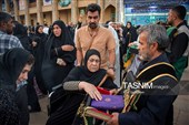 مراسم لاله گردانی خدام حرم مطهر حضرت شاهچراغ (ع) در شام غریبان شهادت امام رضا (ع)