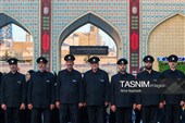 آیین تعویض پرچم گنبد حرم مطهر رضوی