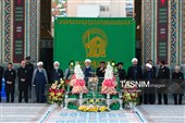 آیین تعویض پرچم گنبد حرم مطهر رضوی