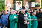 آیین تعویض پرچم گنبد حرم مطهر رضوی