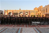 آیین تعویض پرچم گنبد حرم مطهر رضوی