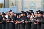 آیین تعویض پرچم گنبد حرم مطهر رضوی