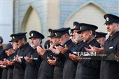 آیین تعویض پرچم گنبد حرم مطهر رضوی