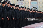 آیین تعویض پرچم گنبد حرم مطهر رضوی