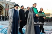 آیین تعویض پرچم گنبد حرم مطهر رضوی