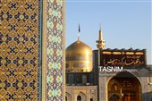 آیین تعویض پرچم گنبد حرم مطهر رضوی