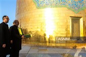 آیین تعویض پرچم گنبد حرم مطهر رضوی