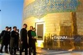 آیین تعویض پرچم گنبد حرم مطهر رضوی