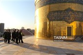 آیین تعویض پرچم گنبد حرم مطهر رضوی