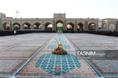 آیین تعویض پرچم گنبد حرم مطهر رضوی