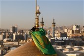 آیین تعویض پرچم گنبد حرم مطهر رضوی