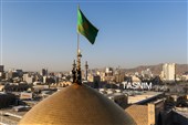 آیین تعویض پرچم گنبد حرم مطهر رضوی
