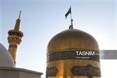 آیین تعویض پرچم گنبد حرم مطهر رضوی