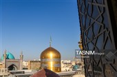 آیین تعویض پرچم گنبد حرم مطهر رضوی