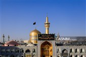 تعویض پرچم و نصب کتیبه‌های شهادت امام حسن عسکری(ع) در حرم مطهر رضوی