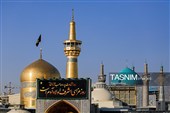 تعویض پرچم و نصب کتیبه‌های شهادت امام حسن عسکری(ع) در حرم مطهر رضوی